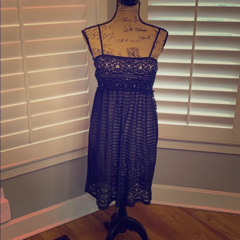 Navy blue sundress with white underlayer